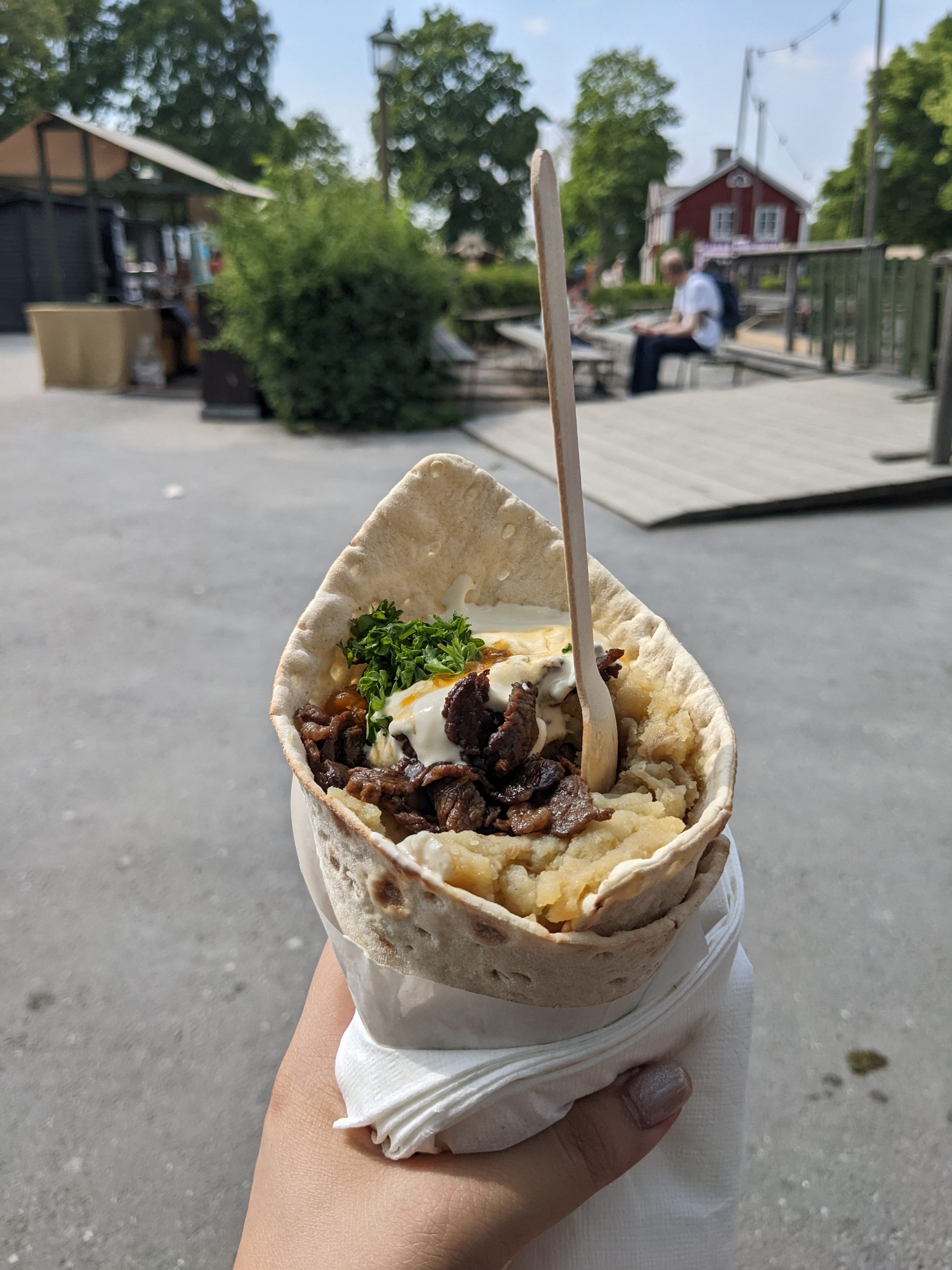 A wrap filled with meat and mashed potatoes