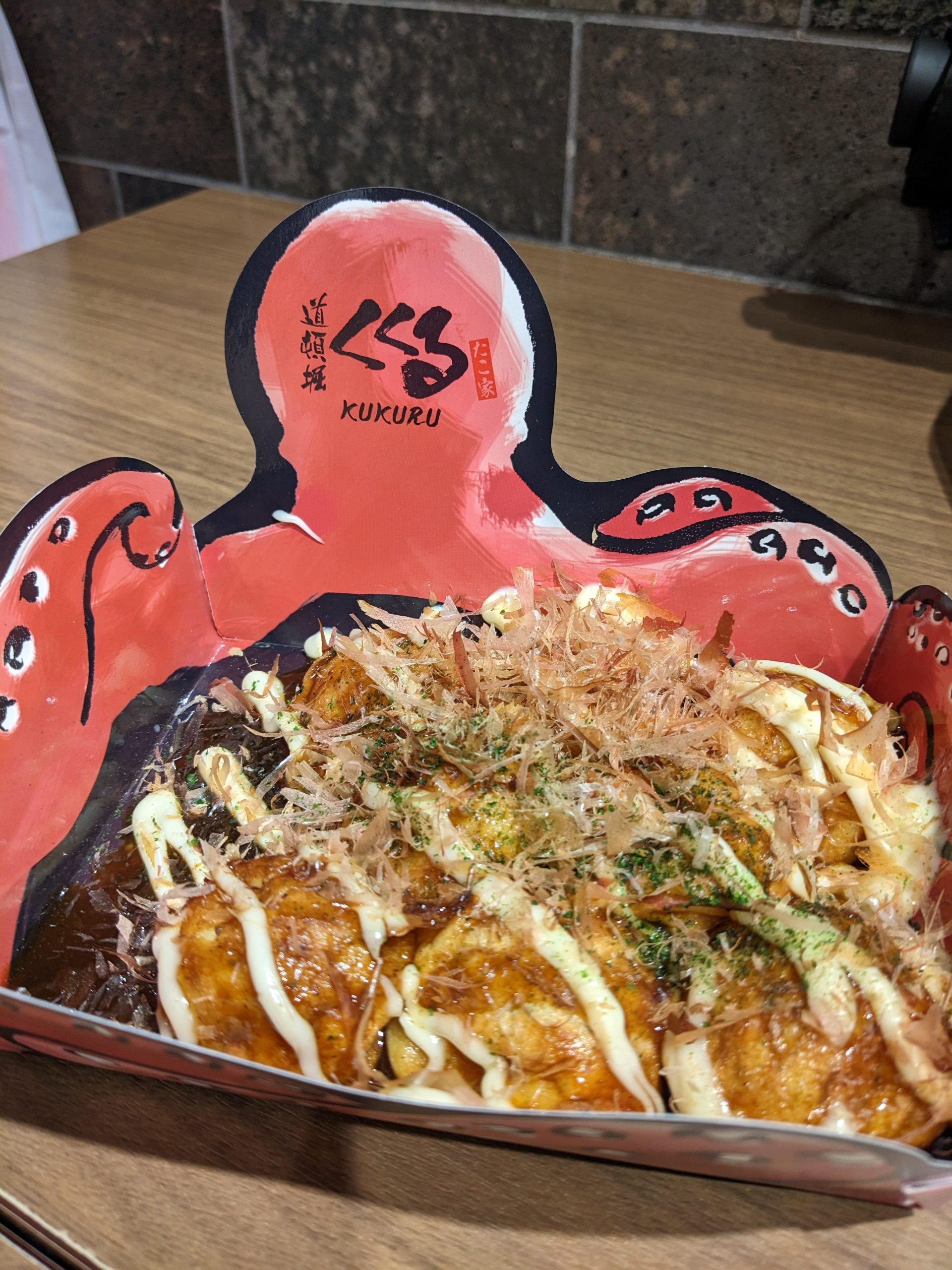 A tray of takoyaki.
